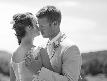 Josh & Jaime share a romantic wedding moment in Kewadin, Michigan